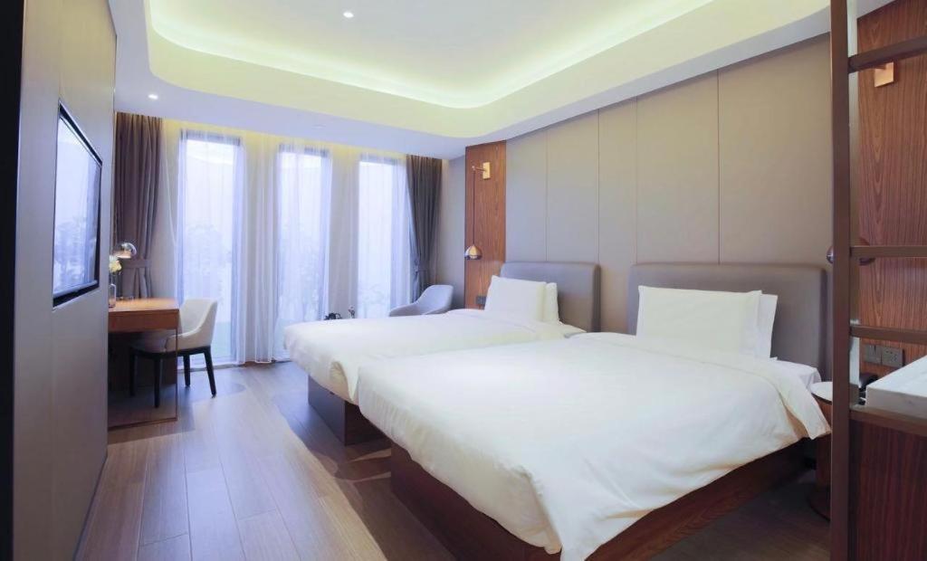 Yitel Collection Collection Harbin Railway Station Post Square Qiulin Hotel Bagian luar foto